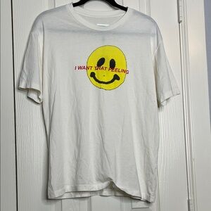 NWT UNIF White Tee with Yellow Smiley and Red Text